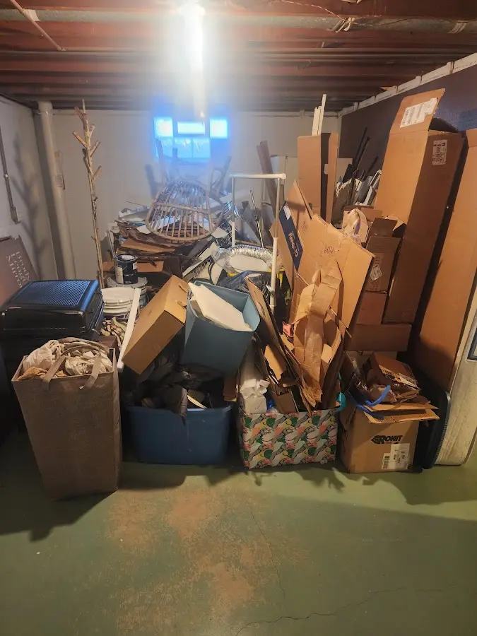 Roll-off dumpster container at job site for 6 Yard Dumpster Rental in Kirtland